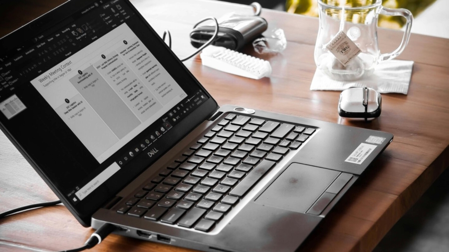 open-laptop-lying-on-coffee-table