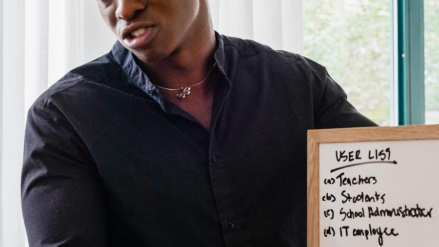 a-man-talking-near-a-whiteboard